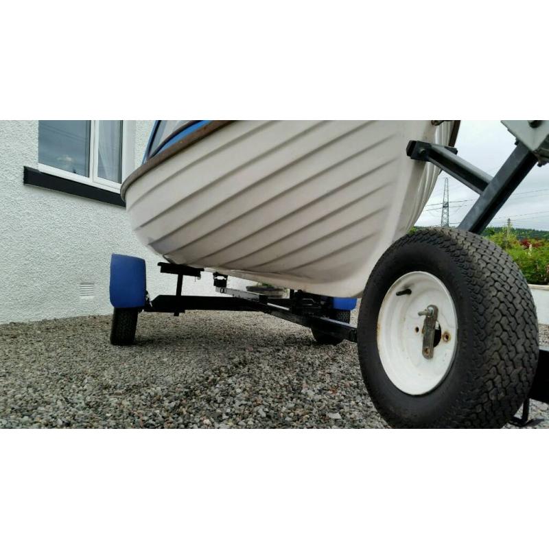 Fishing boat trailer outboard