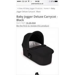 Baby Jogger Black Deluxe Carry Cot in Black with adaptors.