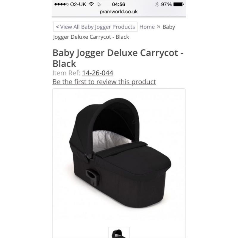 Baby Jogger Black Deluxe Carry Cot in Black with adaptors.
