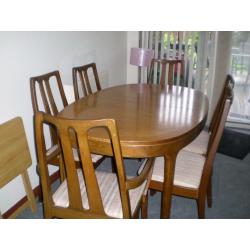 Extending Dining Table and 6 Chairs.