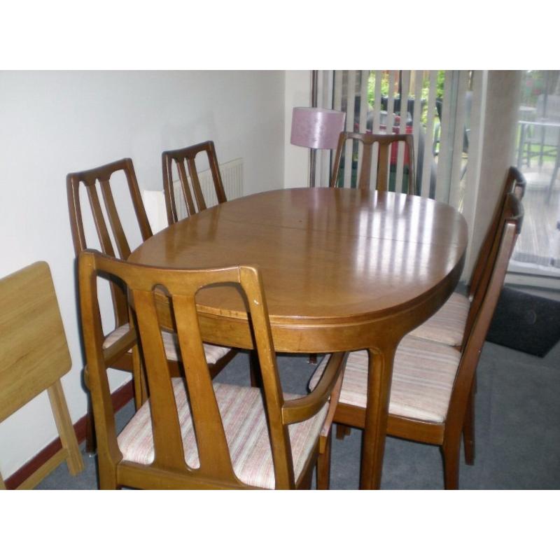 Extending Dining Table and 6 Chairs.