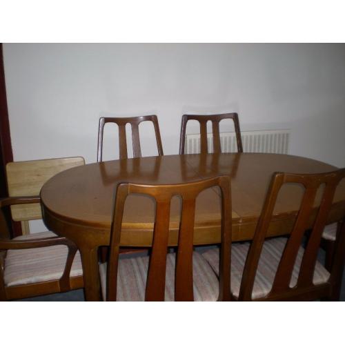 Extending Dining Table and 6 Chairs.