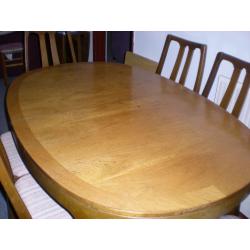 Extending Dining Table and 6 Chairs.