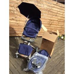 Hardly Used Stokke Xplory V4 with carrycot, car seat adaptors, parasol and cup holder