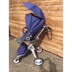 Hardly Used Stokke Xplory V4 with carrycot, car seat adaptors, parasol and cup holder