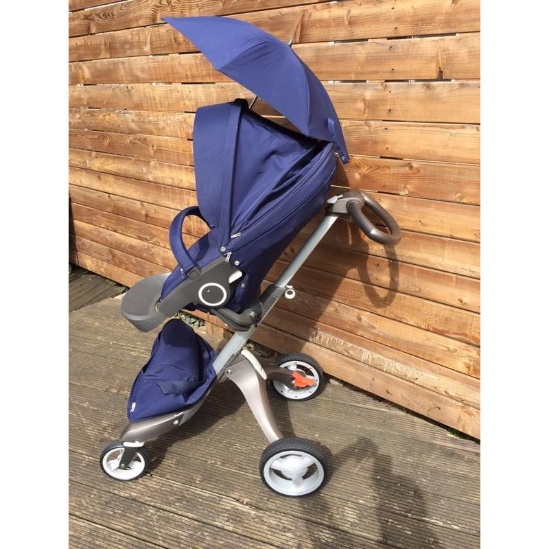 Hardly Used Stokke Xplory V4 with carrycot, car seat adaptors, parasol and cup holder