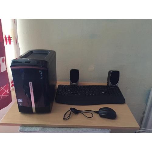 desktop with mouse keyboard speakers