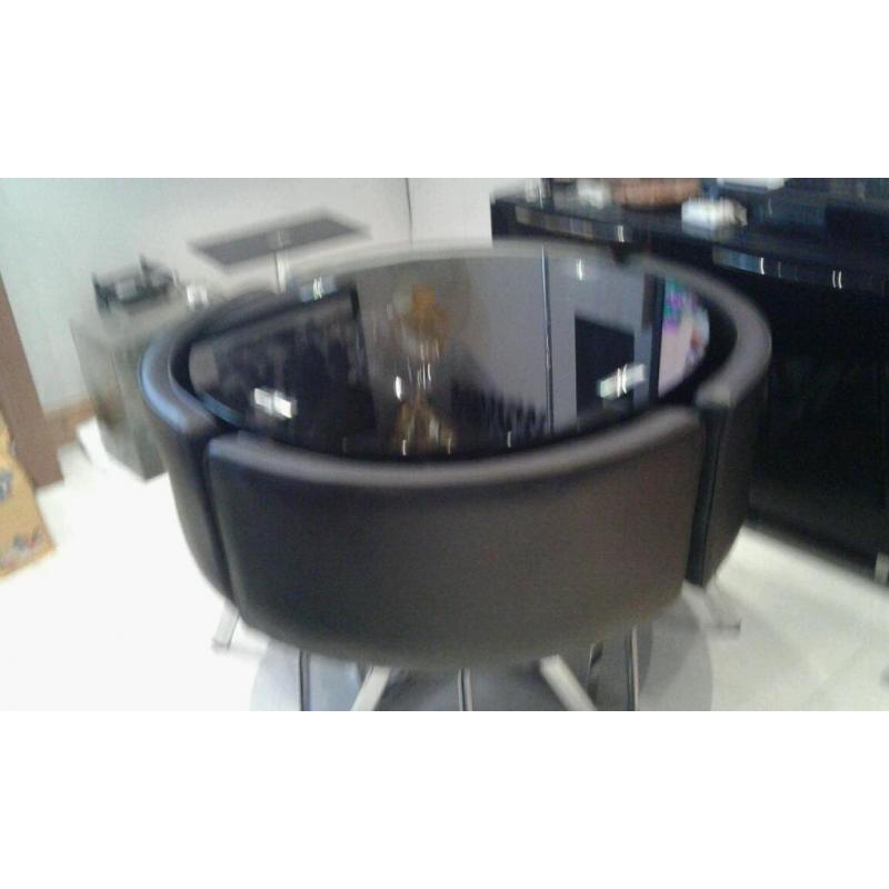 Glass table and 4 chairs
