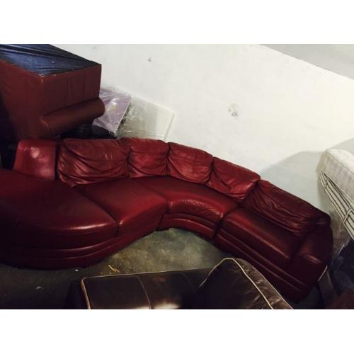 Large red leather corner sofa