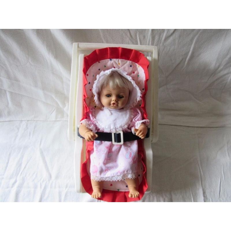 DOLL WITH CAR SEAT