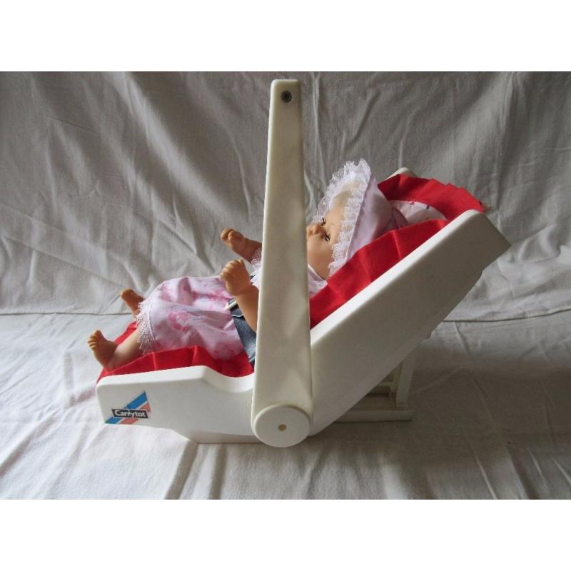 DOLL WITH CAR SEAT