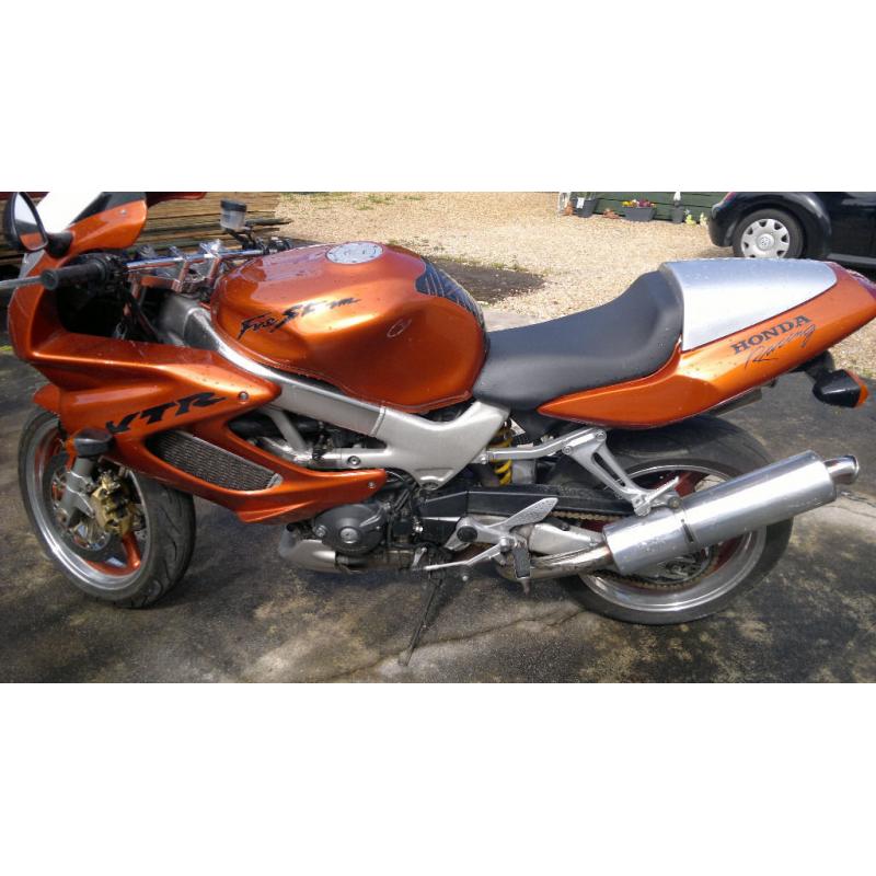 honda VTR 1000 fair condition for its year,must go,cheep bike for some one !!!!!