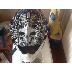 Two adults small motor cross helmets