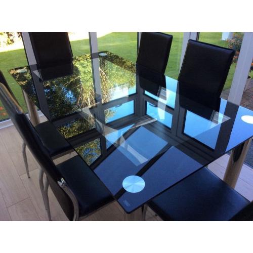 Glass and chrome dining table and chairs