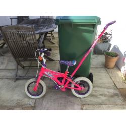 Childs learn to ride bike