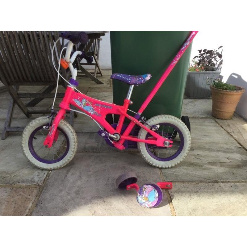 Childs learn to ride bike