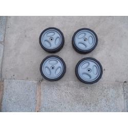4 x plastic lawnmower wheels used.