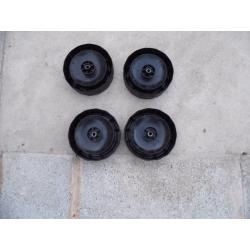 4 x plastic lawnmower wheels used.