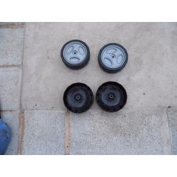 4 x plastic lawnmower wheels used.