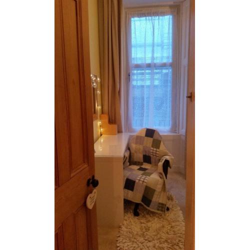 Bright, double room with lots of storage and small double high sleeper. Available to students