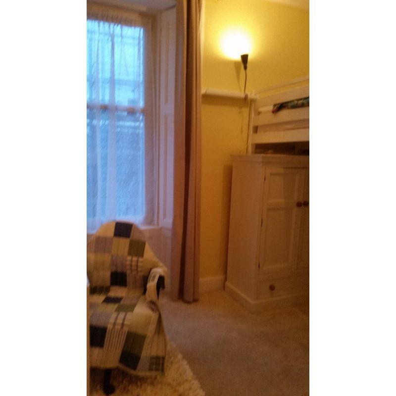 Bright, double room with lots of storage and small double high sleeper. Available to students