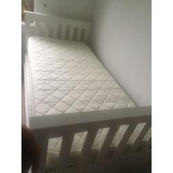Single bed that slides into a double bed