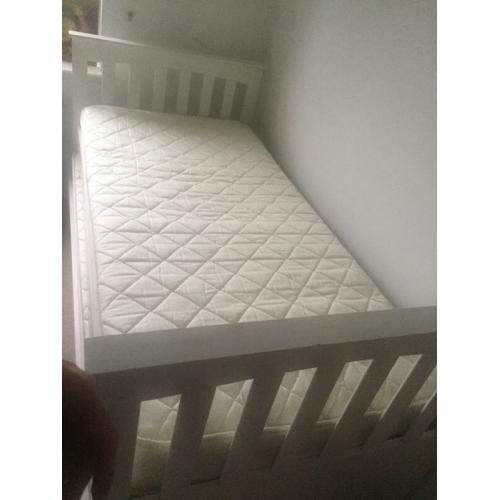 Single bed that slides into a double bed