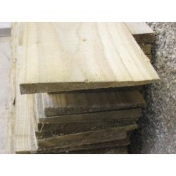 Feather edged fencing.