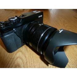 Fuji XE1 mirrorless compact with XF 18-55 lens plus extras.