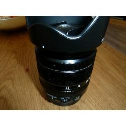 Fuji XE1 mirrorless compact with XF 18-55 lens plus extras.