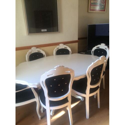 Dining room table and 6 chairs