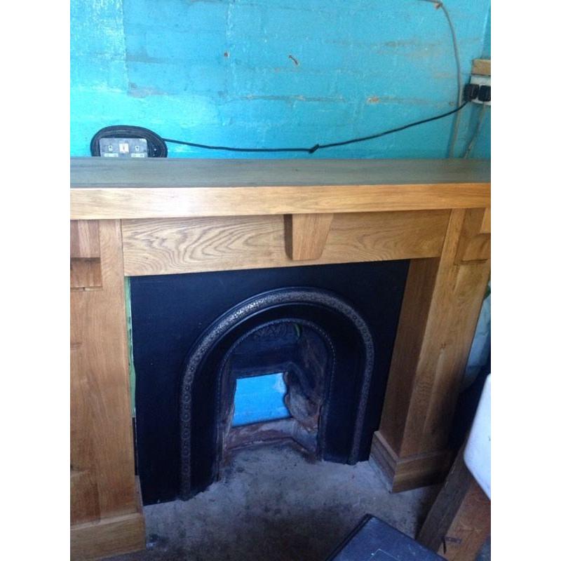 Cast iron fire and surrounded frame