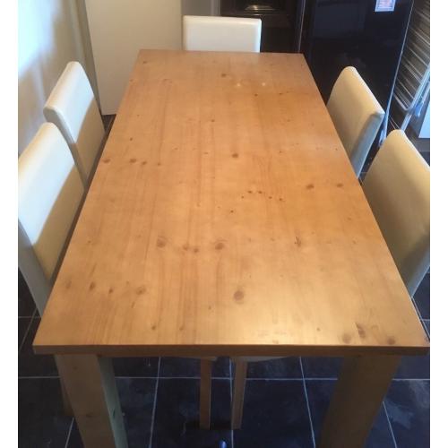 Kitchen table and 5 leather look cream chairs