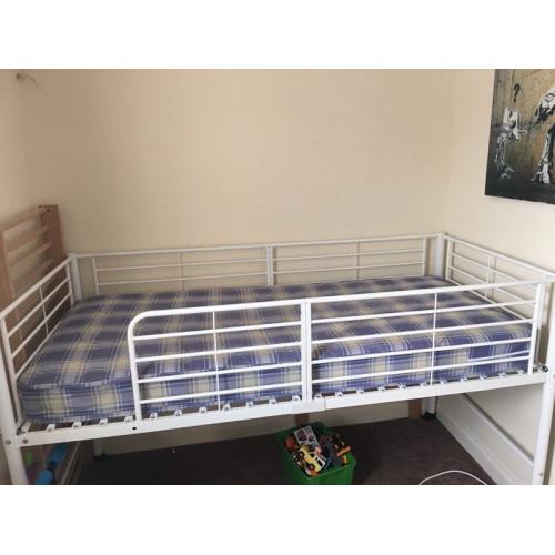 IKEA white loft bed. Perfect for storage.