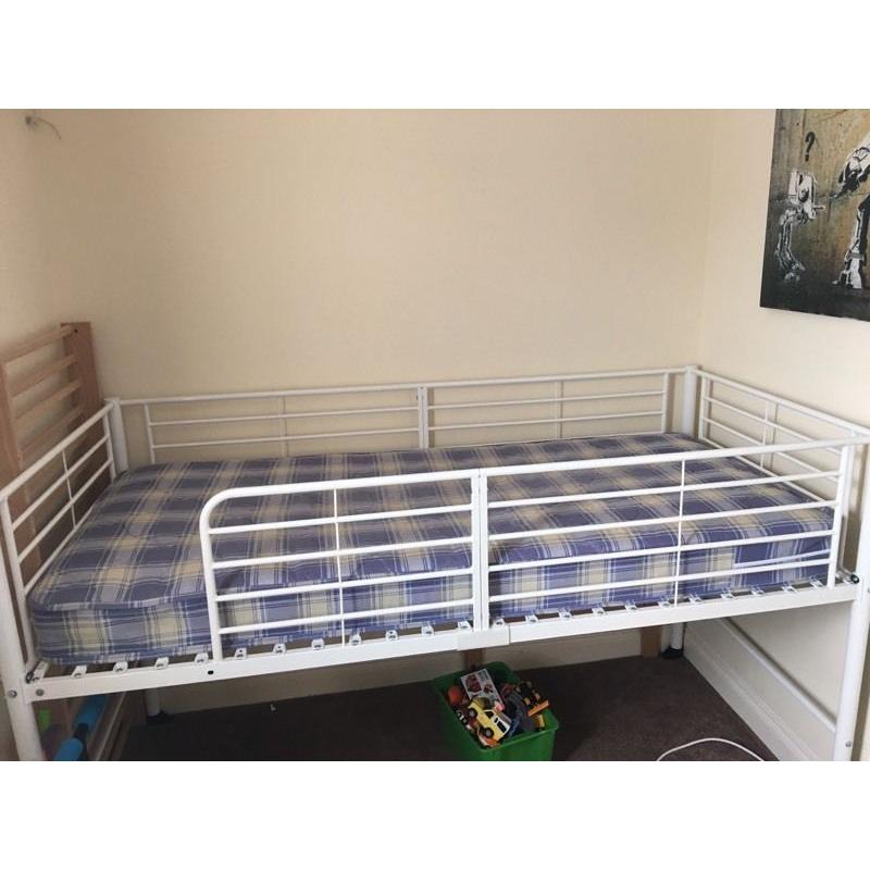 IKEA white loft bed. Perfect for storage.