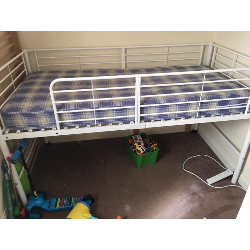 IKEA white loft bed. Perfect for storage.