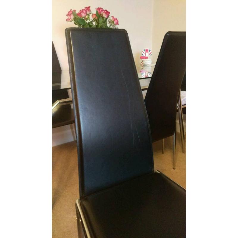 Glass table with 6 chairs