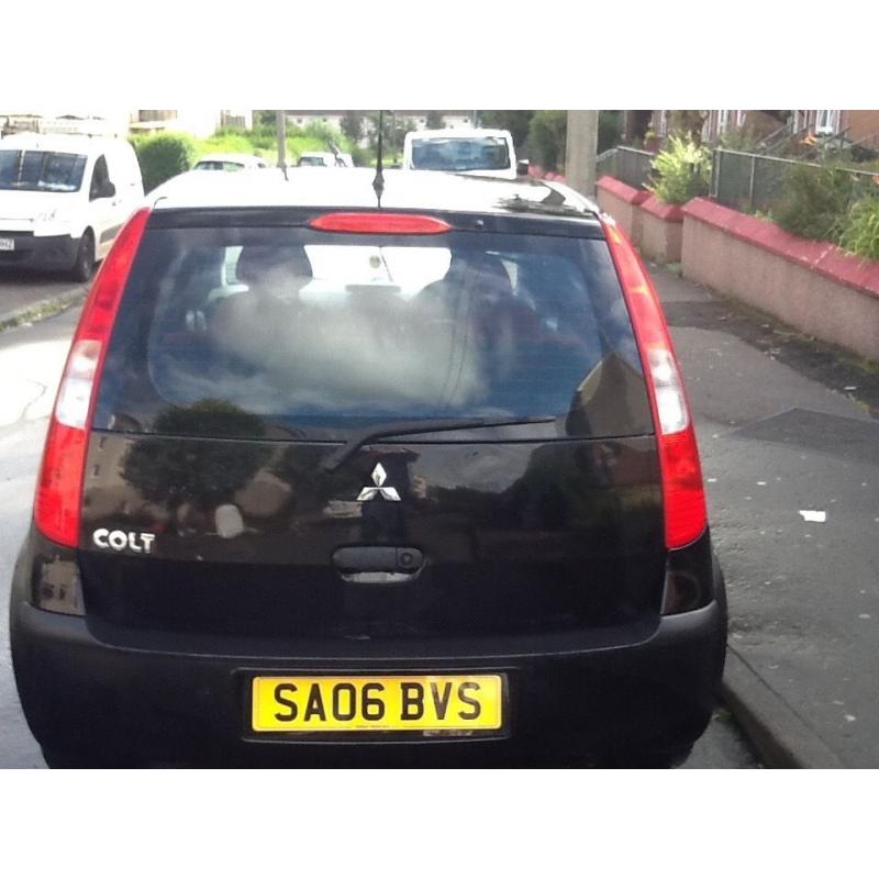 06 MITSUBISHI COLT BLACK REDUCED
