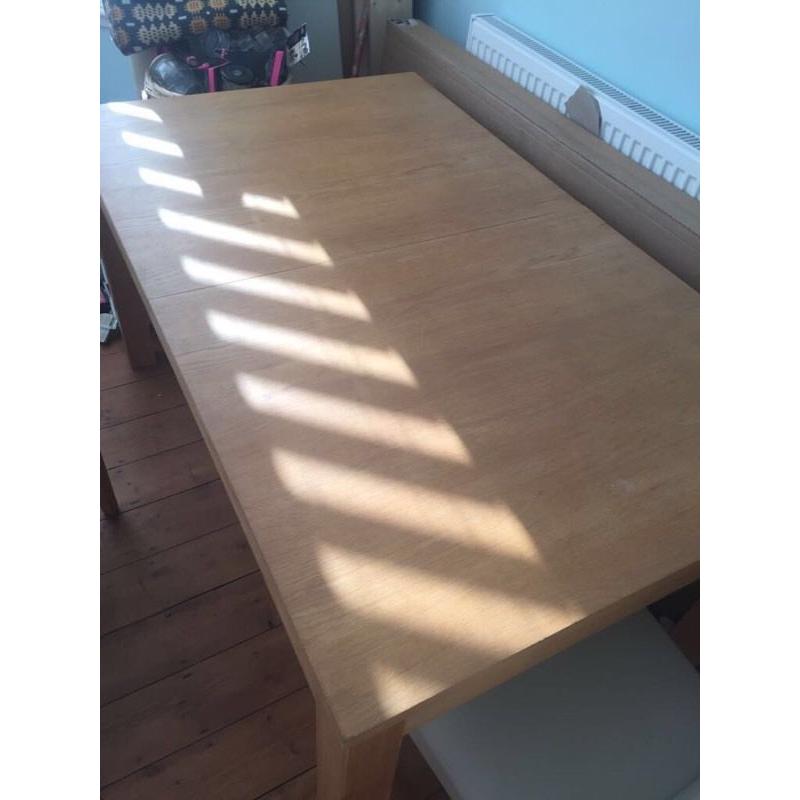 4 seater expands to 8 seater table (without chairs)