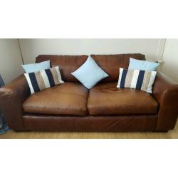 Brown leather sofa