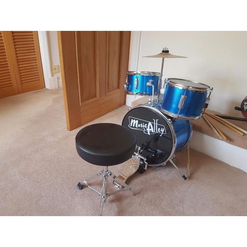 Kids 4 piece drum kit plus stool