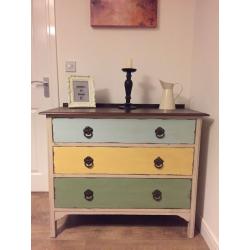 A beautiful funky upcycled chest of drawers with distressed finish