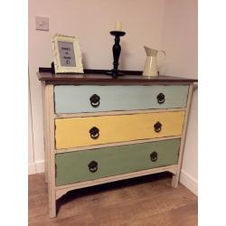 A beautiful funky upcycled chest of drawers with distressed finish