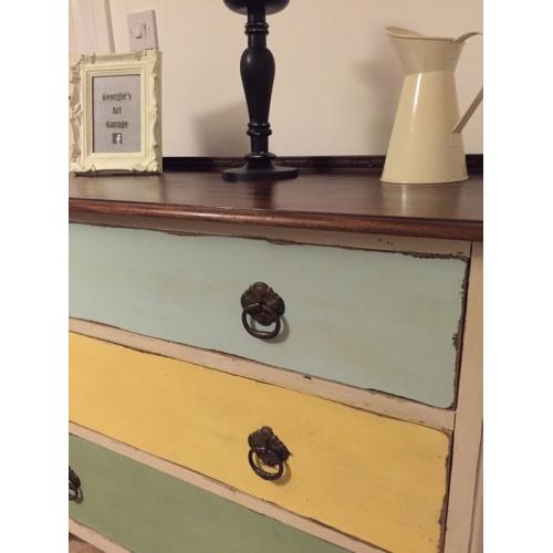 A beautiful funky upcycled chest of drawers with distressed finish