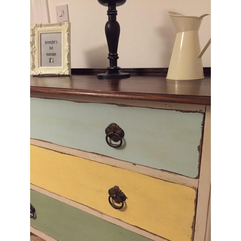 A beautiful funky upcycled chest of drawers with distressed finish