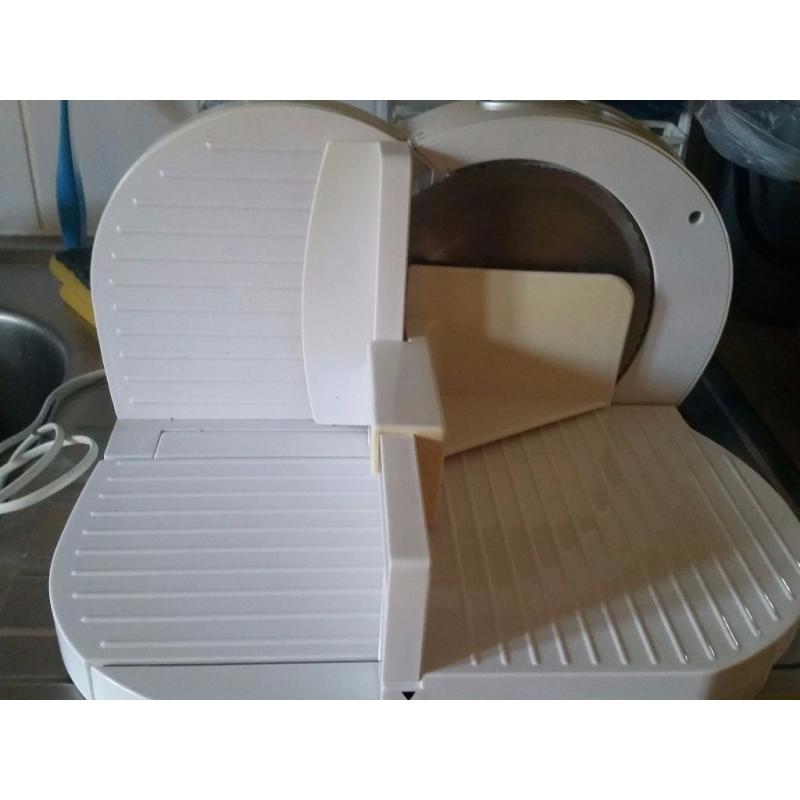 Electric bread and ham slicer