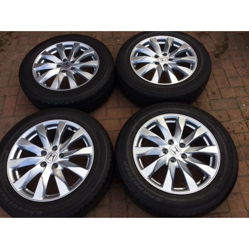 Honda CRV 4 x Alloys with tyres. Amazing condition.