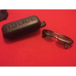 Police sunglasses and wallet