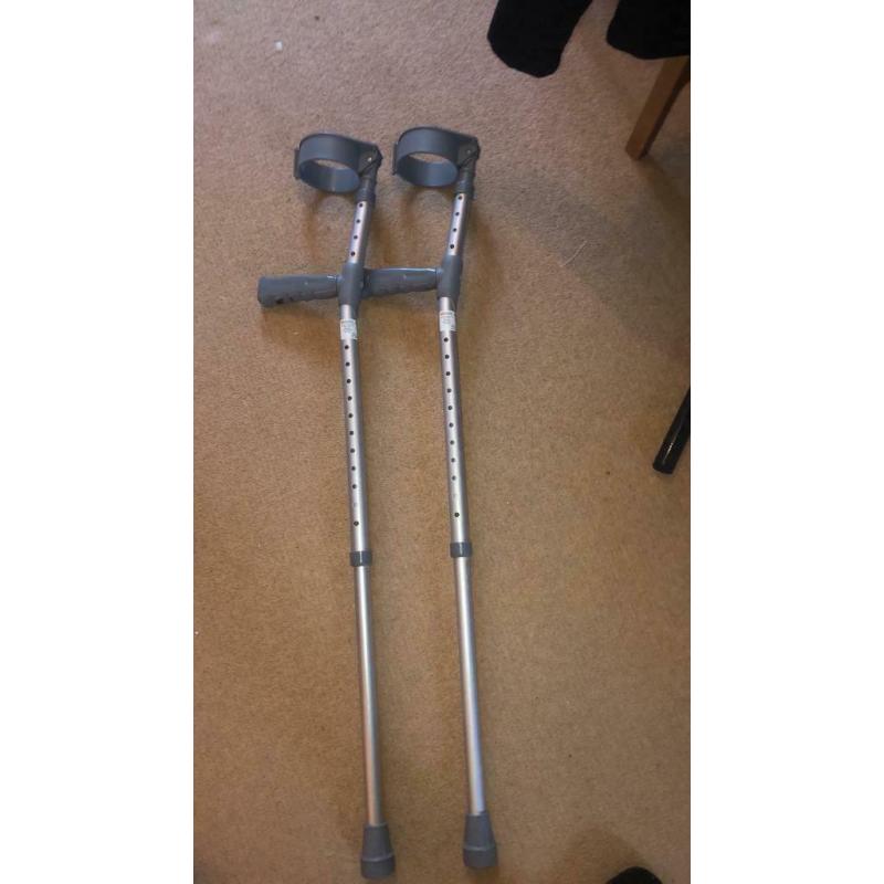 Adjustable crutches