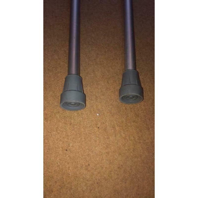 Adjustable crutches